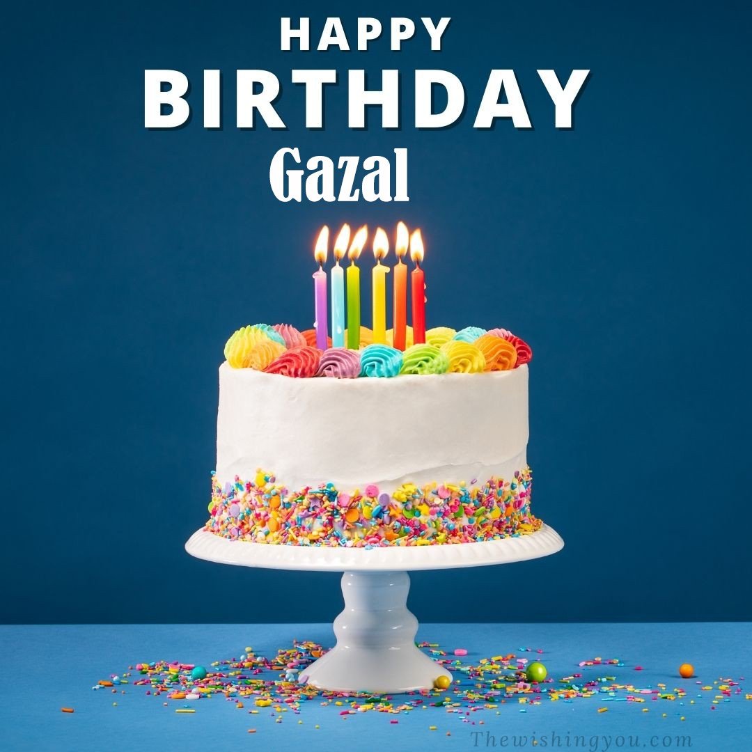 Happy birthday Gazal written on image White cake keep on White stand and burning candles Sky background