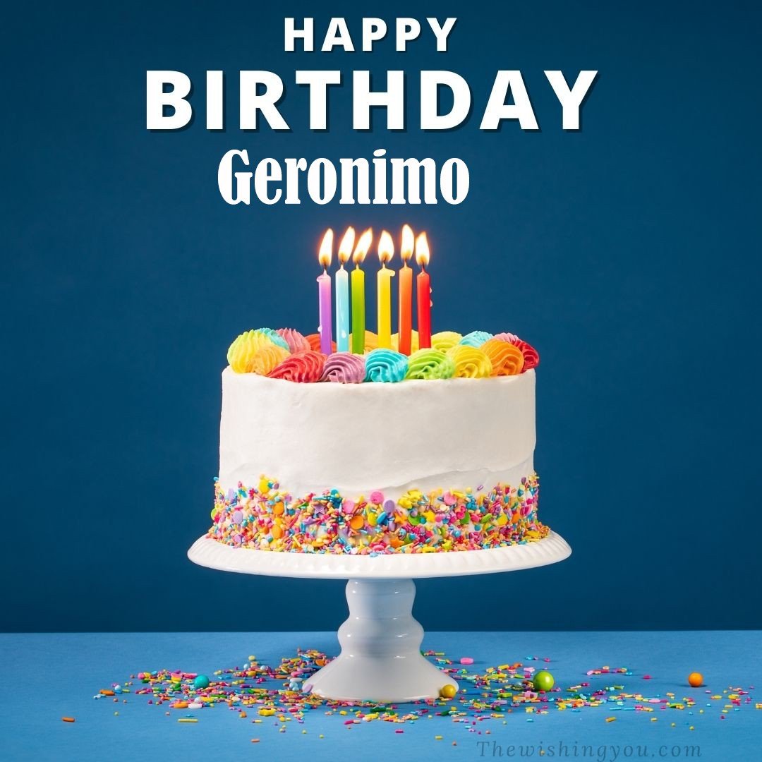 Happy birthday Geronimo written on image White cake keep on White stand and burning candles Sky background