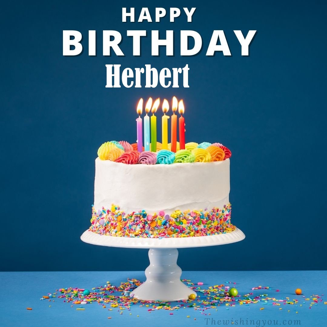 Happy birthday Herbert written on image White cake keep on White stand and burning candles Sky background