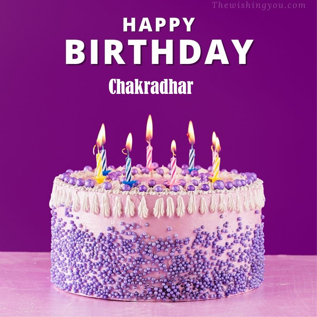Happy Birthday Chakradhar written on image White and blue cake and burning candles Violet background