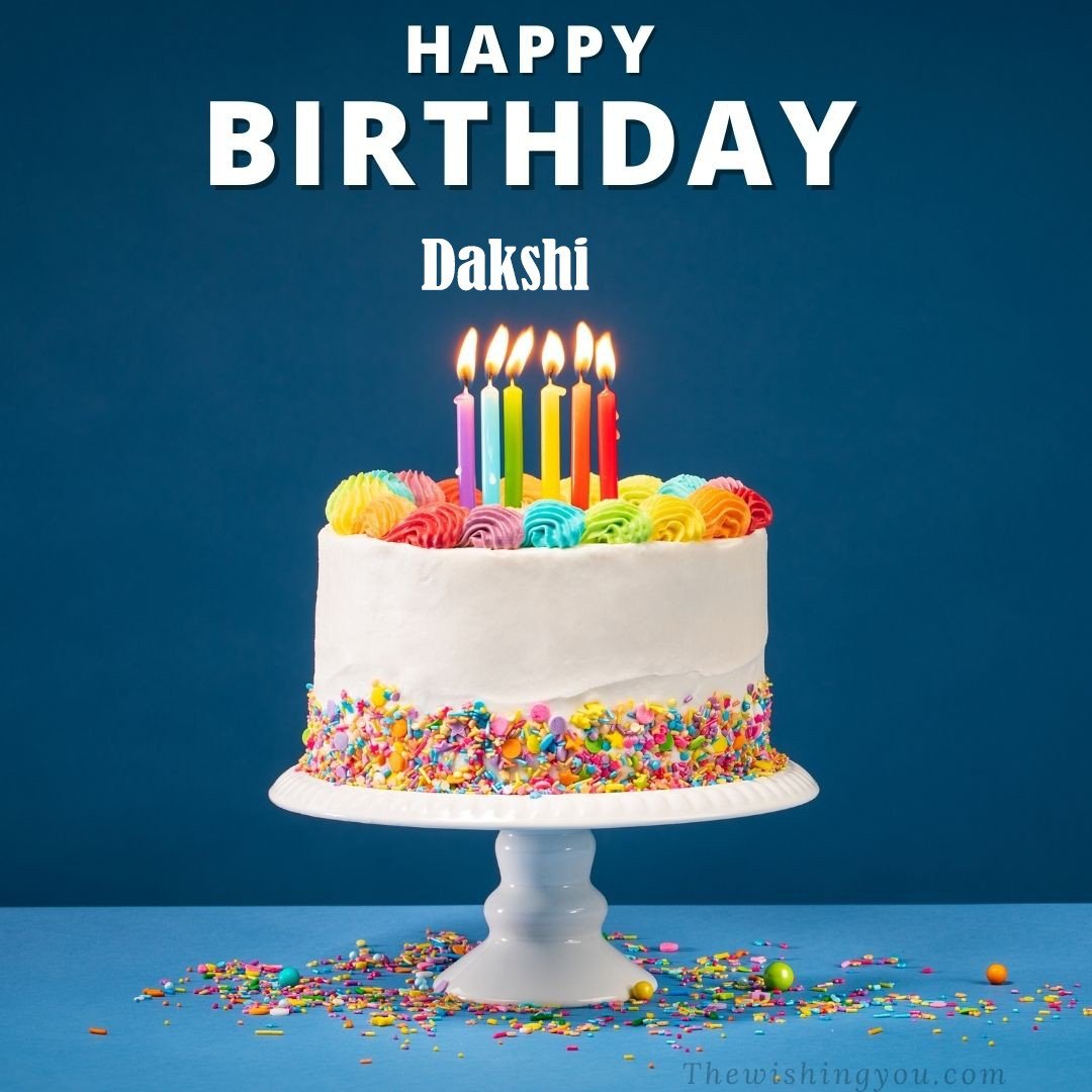 Happy Birthday Dakshi written on image White cake keep on White stand and burning candles Sky background
