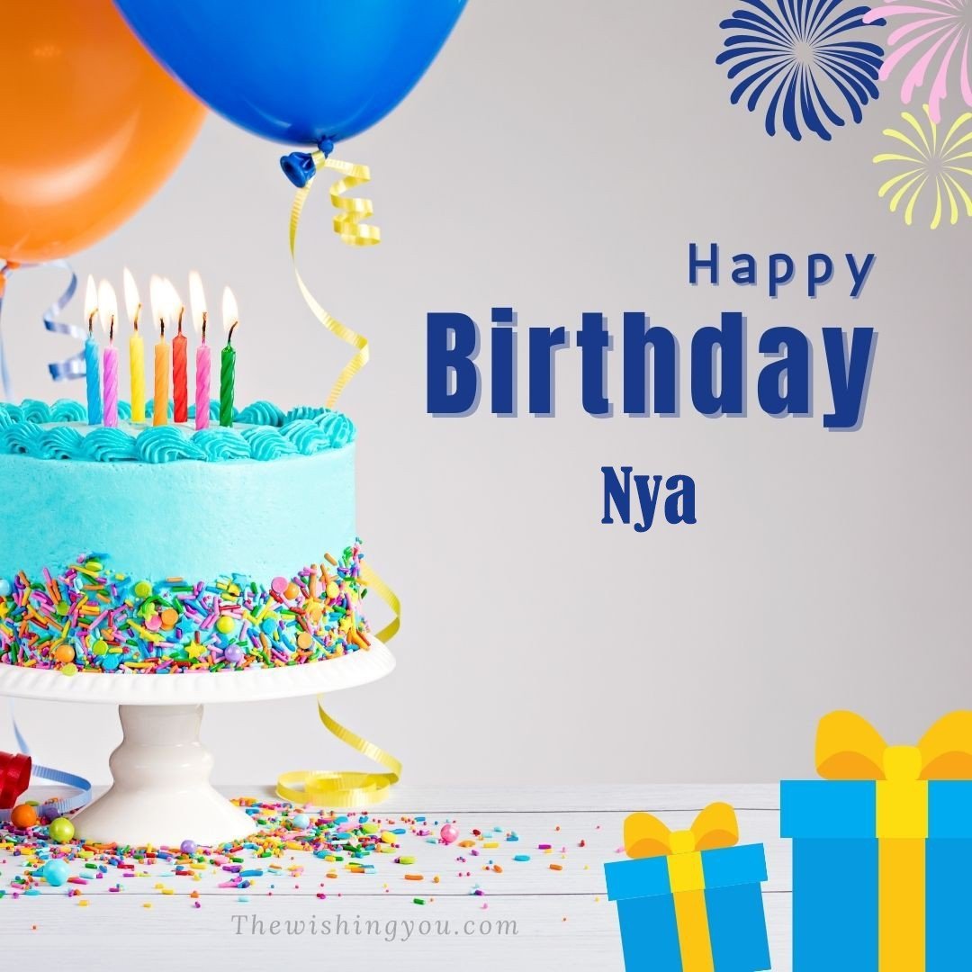 Happy Birthday Nya written on image Green cake keep on White stand and blue gift boxes with Yellow ribon with Sky background