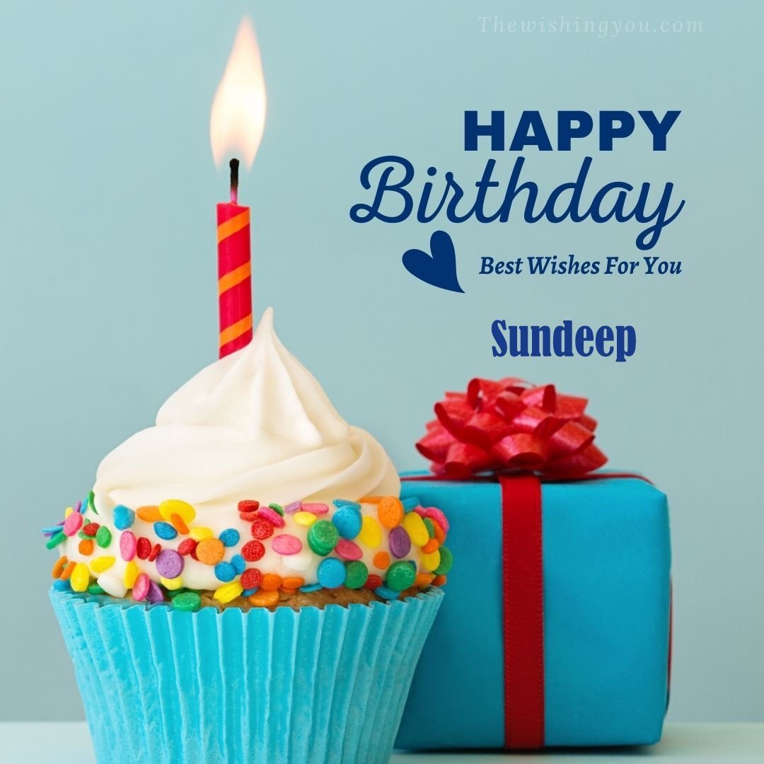 Happy Birthday Sundeep written on image Blue Cup cake and burning candle blue Gift boxes with red ribon