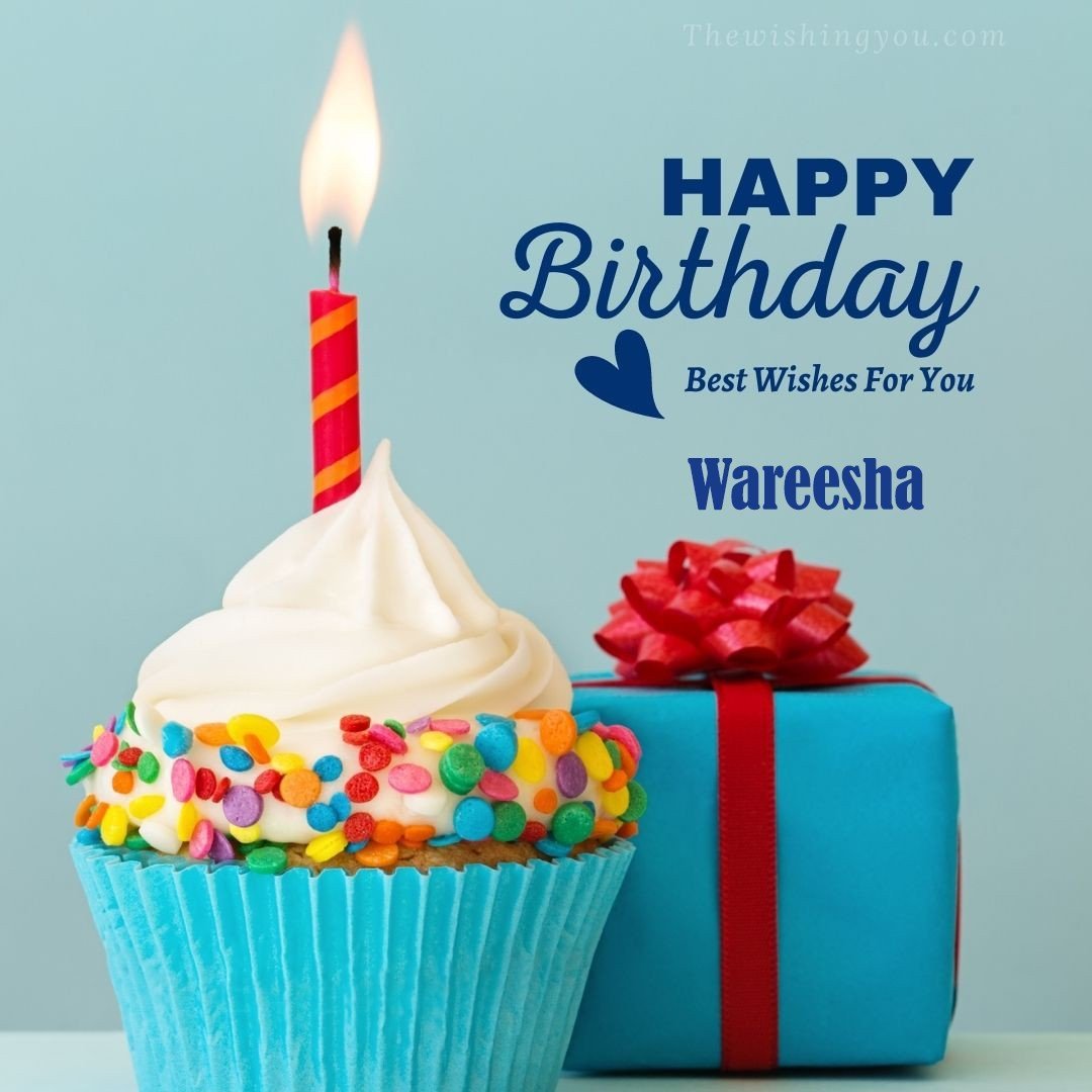 Happy Birthday Wareesha written on image Blue Cup cake and burning candle blue Gift boxes with red ribon