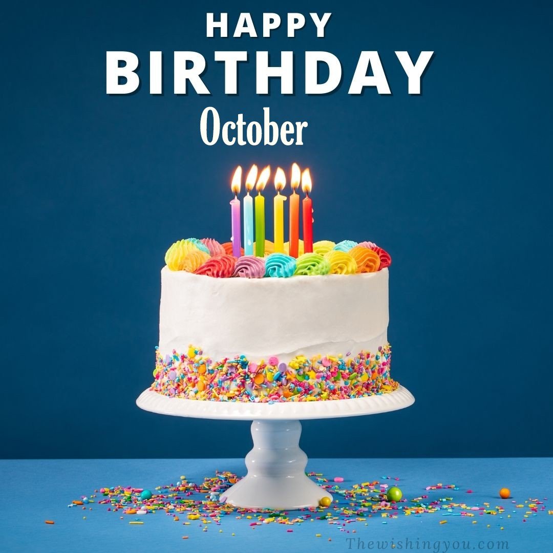 Happy birthday October written on image White cake keep on White stand and burning candles Sky background