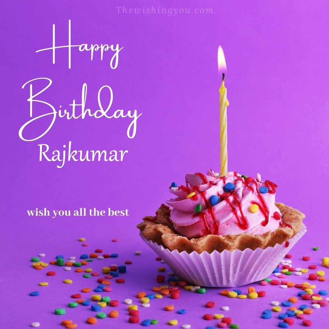 Happy birthday Rajkumar written on image cup cake burning candle Purple background