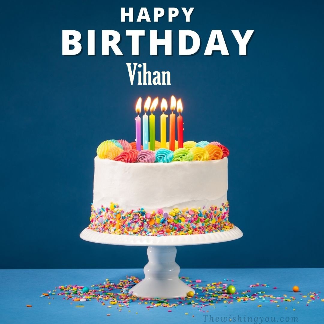 Happy birthday Vihan written on image White cake keep on White stand and burning candles Sky background