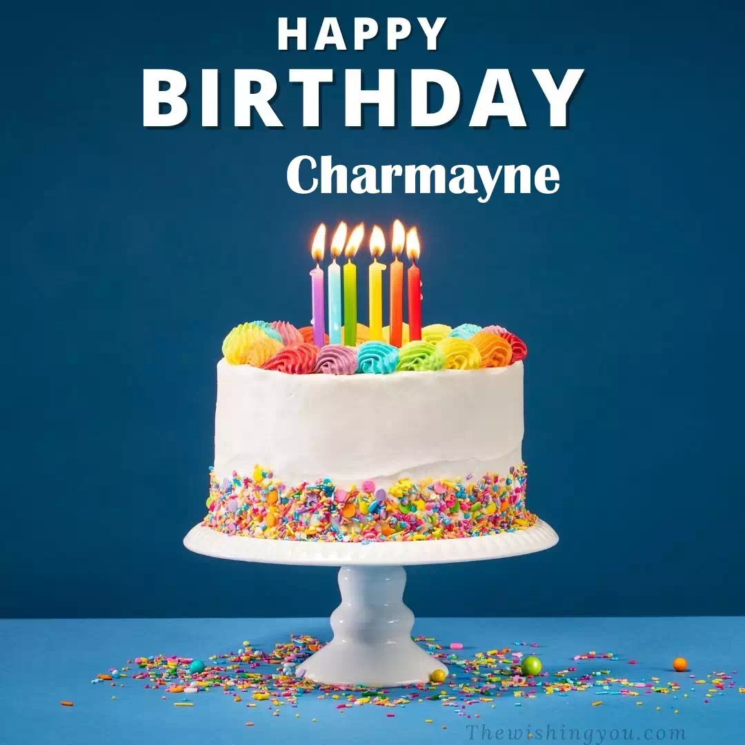 Happy Birthday Charmayne written on image, White cake keep on White stand and burning candles Sky background